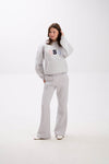 Comfortable grey USA hoodie and sweatpants set with elastic waist and multicolor embroidery.