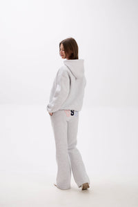 Grey sweatpants featuring elastic waistband, side pockets, and USA lettering on the back.