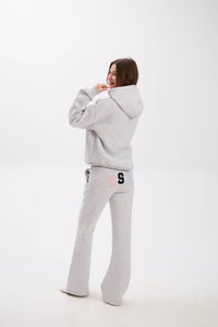 Grey sweatpants featuring elastic waistband, side pockets, and USA lettering on the back.