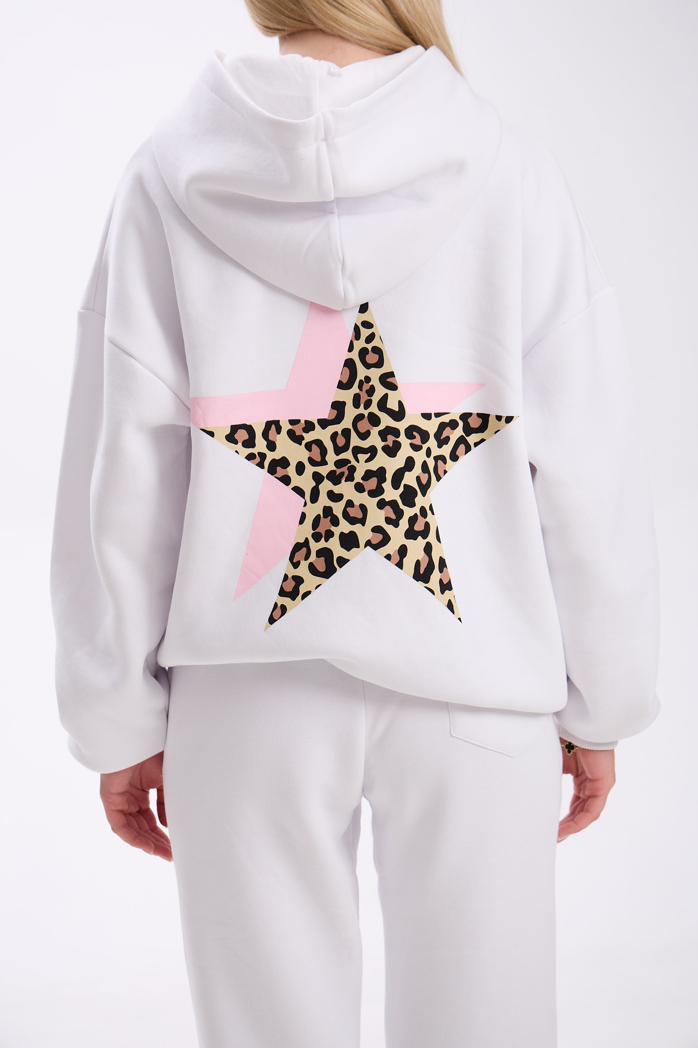 White hoodie with a leopard print star design on a white background