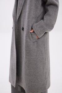 Gray coat with a button on a white background