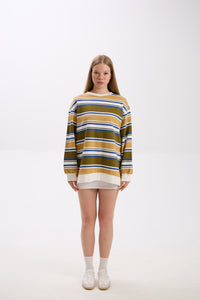 Person wearing a striped sweater on a white background